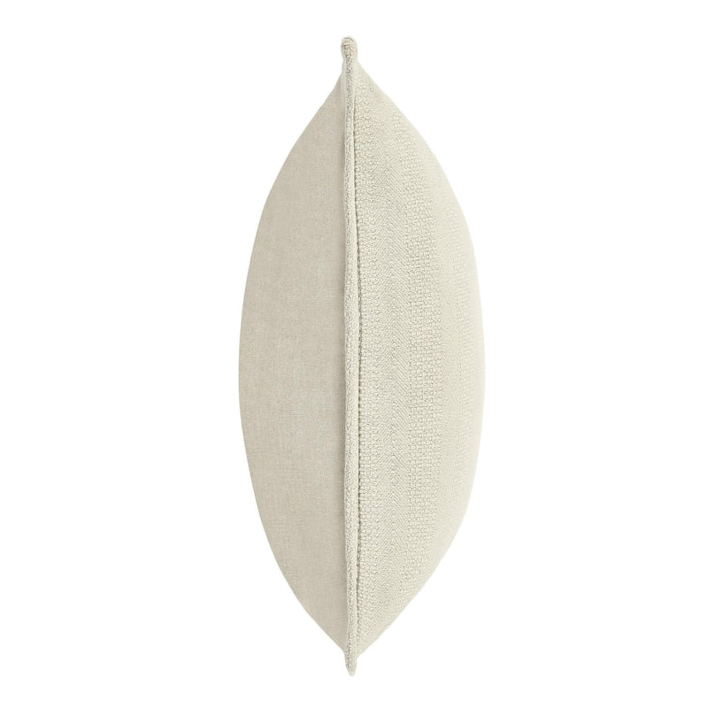 Natural textured throw pillow side view with centered seam and piped edge