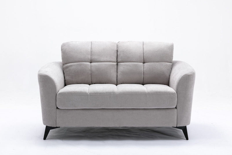 Gray upholstered loveseat with two-seat cushions, tufted back, and black tapered legs