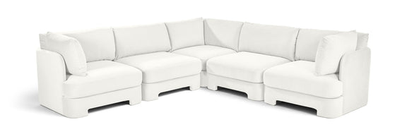 White velvet corner sectional sofa with five-piece modular L-shape and cushioned arms
