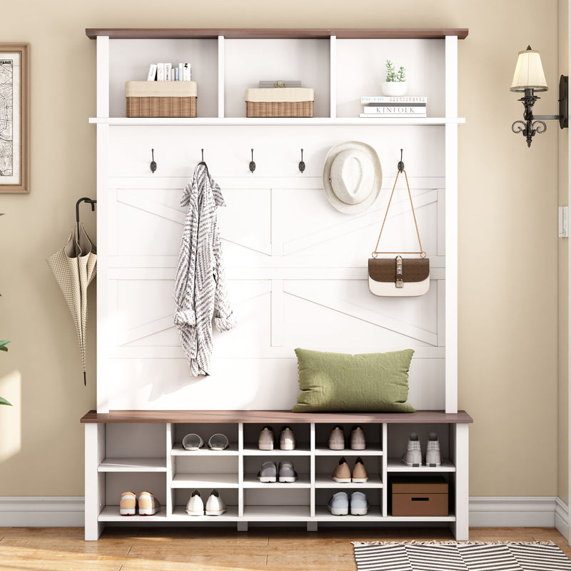 White entryway hall tree with bench, coat hooks, and open storage cubbies