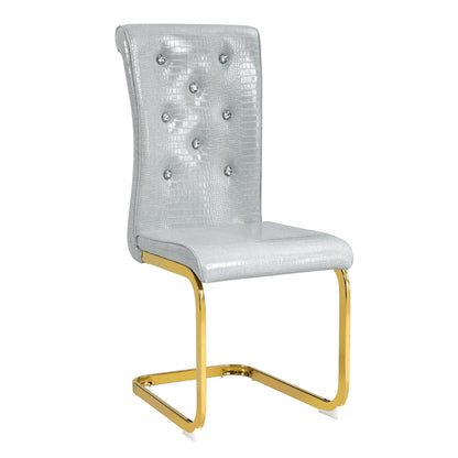 Silver alligator-texture dining chair, studded back, gold metal sled legs
