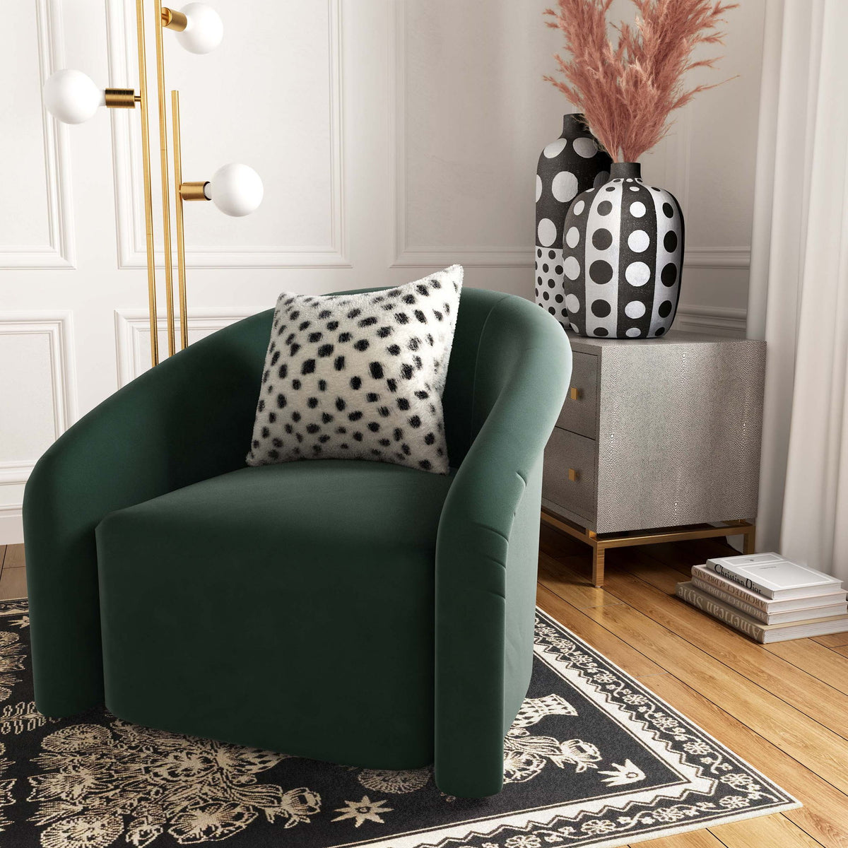 White and black spotted pillow on green armchair, plush fur