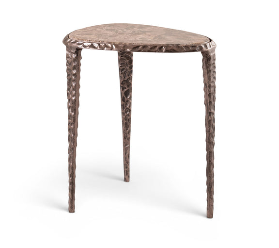 Round marble-top table with dark metal pedestal legs and textured aluminum base