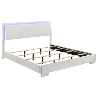 White high-gloss panel bed frame with blue LED light headboard and slatted base