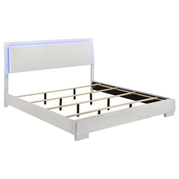 White high-gloss panel bed frame with blue LED light headboard and slatted base