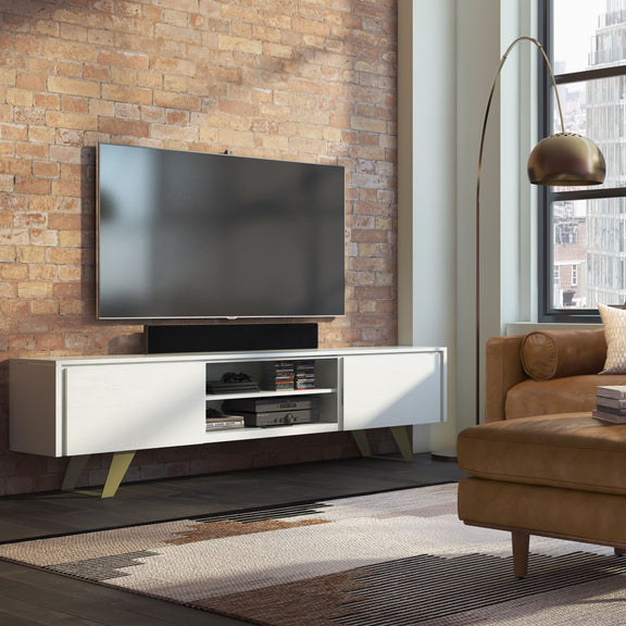 White TV media stand with open center compartment and angled mid-century style legs