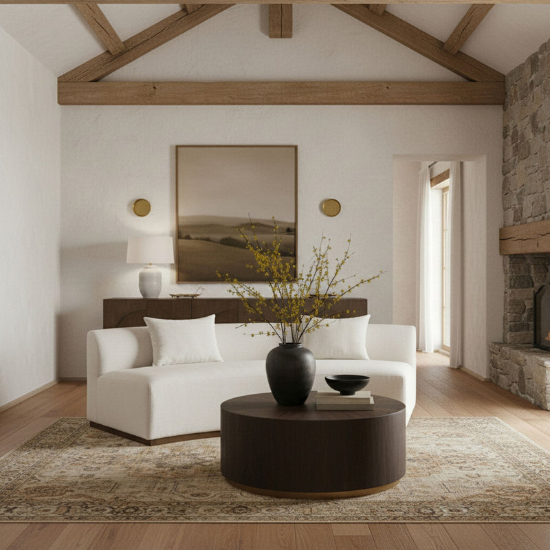 104-inch chenille upholstered sofa in light fabric with green back cushions and dark base.