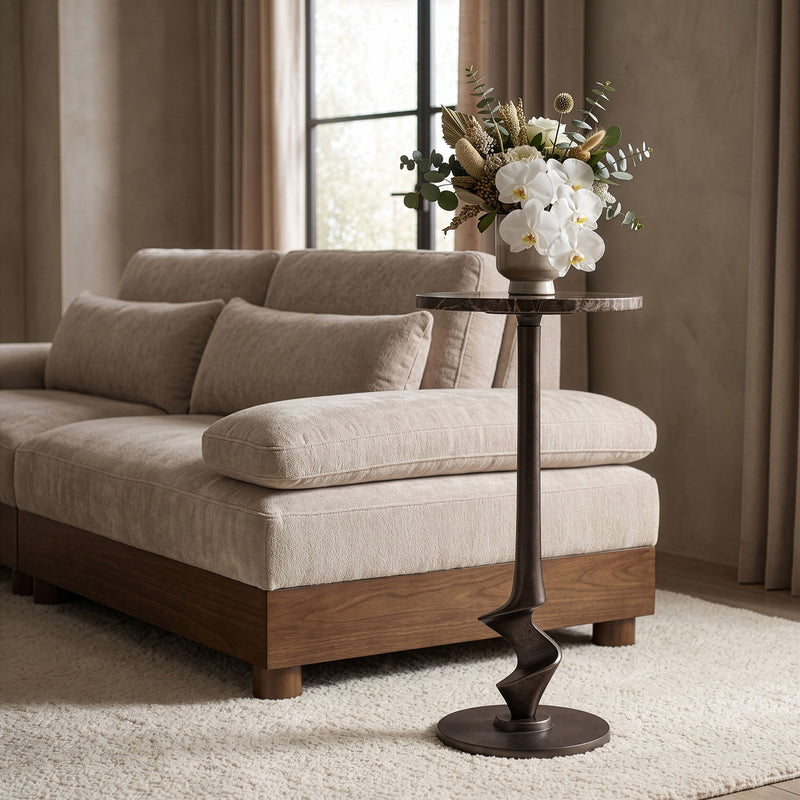 Round aluminum side table with dark bronze twisted pedestal and light top