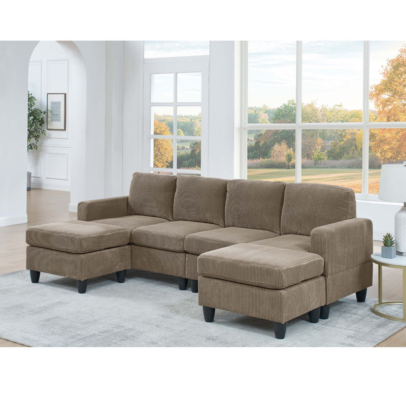 Light brown modular sectional sofa with two ottomans, padded chaise seat, and arms