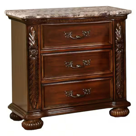 Cherry 3-drawer bedside table with carved sides, brass-tone pulls, and stone-look top