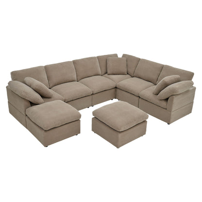 Light brown L-shaped modular sofa with two ottomans and loose back cushions