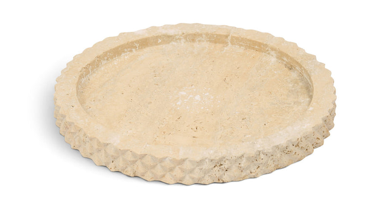 Beige travertine tray with shallow circular basin and scalloped edge, top view.