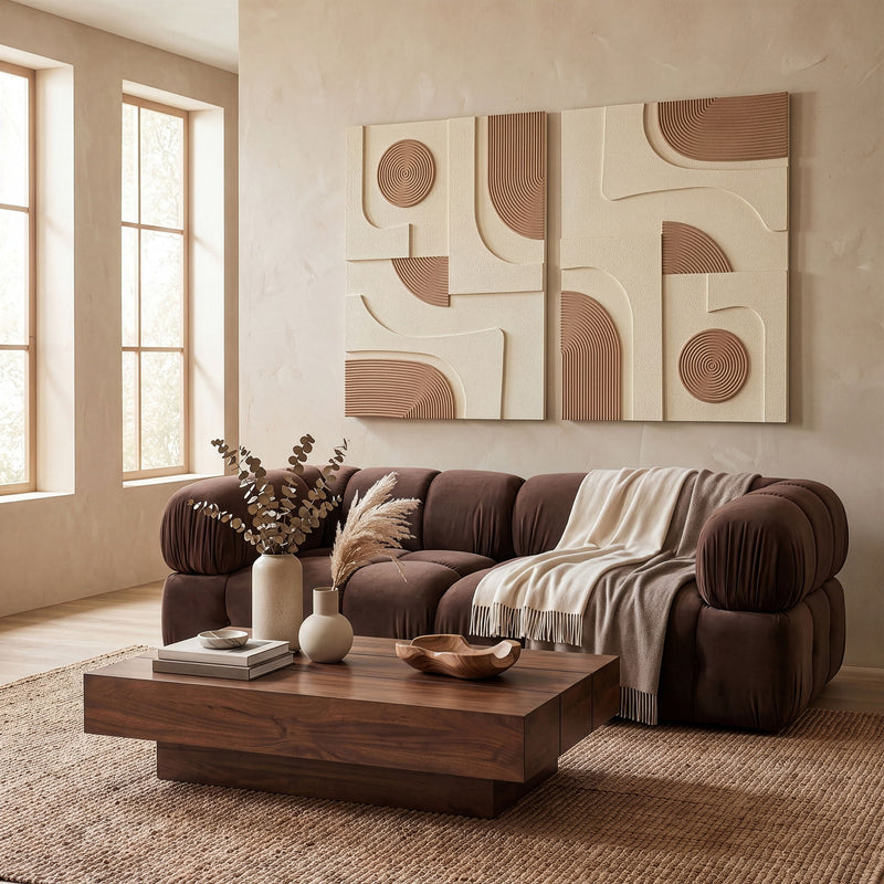 2-piece wall art above sofa, cream textured panels with light brown circular relief designs