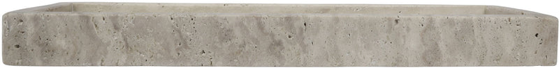 Beige travertine tray side profile with low, thick rim and mottled stone finish