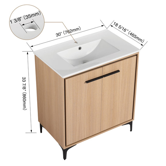 Light brown bathroom vanity cabinet with white sink basin, black bar handle, two doors
