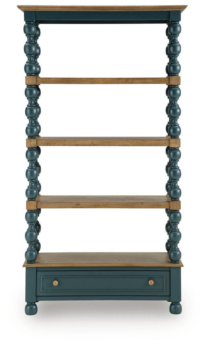 Teal bookcase with four open shelves and a front drawer, framed by turned posts
