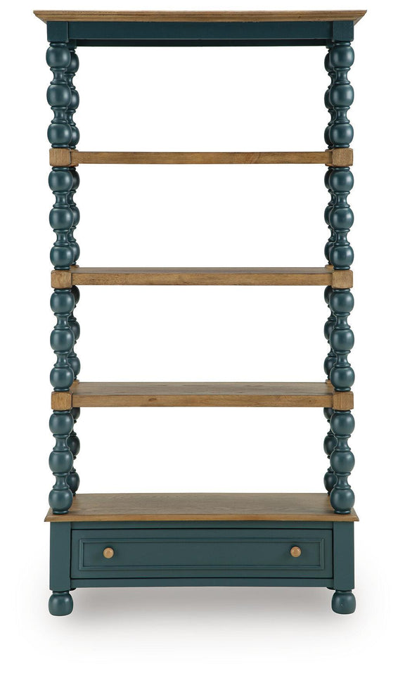Teal bookcase with four open shelves and a front drawer, framed by turned posts