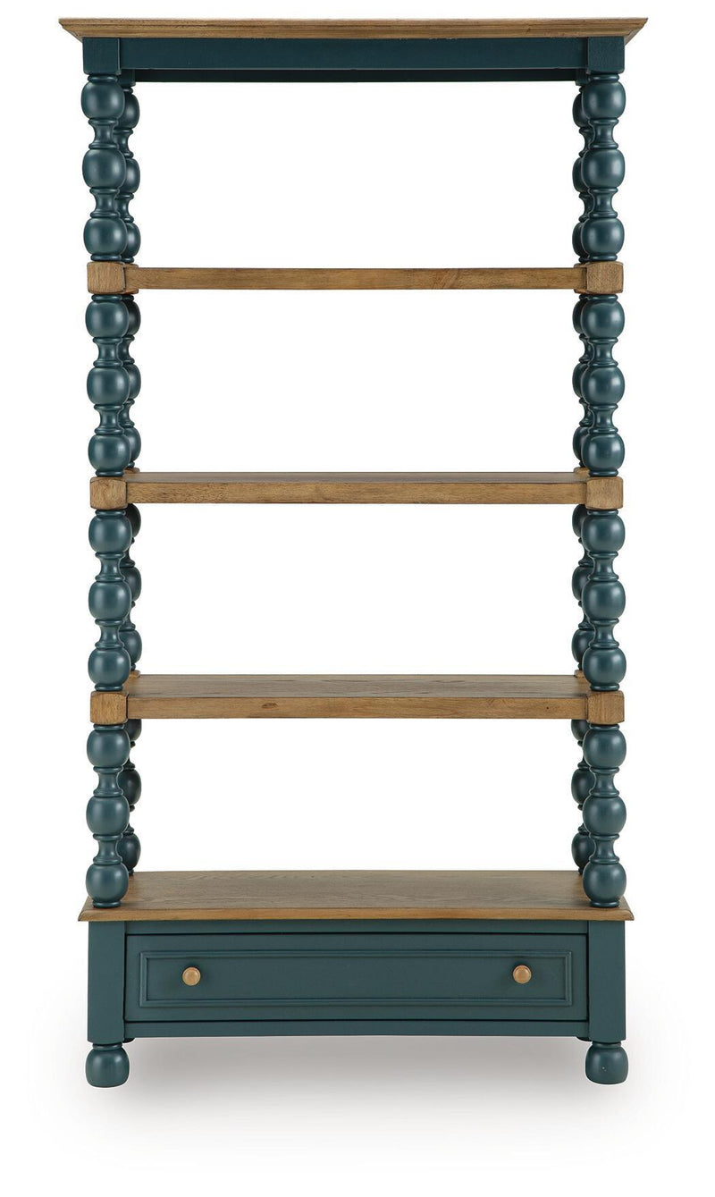 Teal bookcase with four open shelves and a front drawer, framed by turned posts