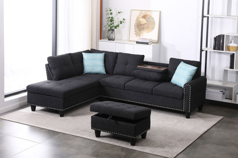 Dark gray sectional sofa with left-facing chaise and ottoman, tufted cushions and blue pillows