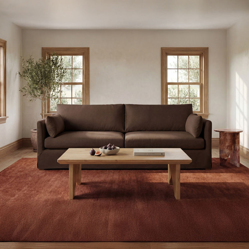 Dark brown 3-seat sofa with rounded arms and split back cushion