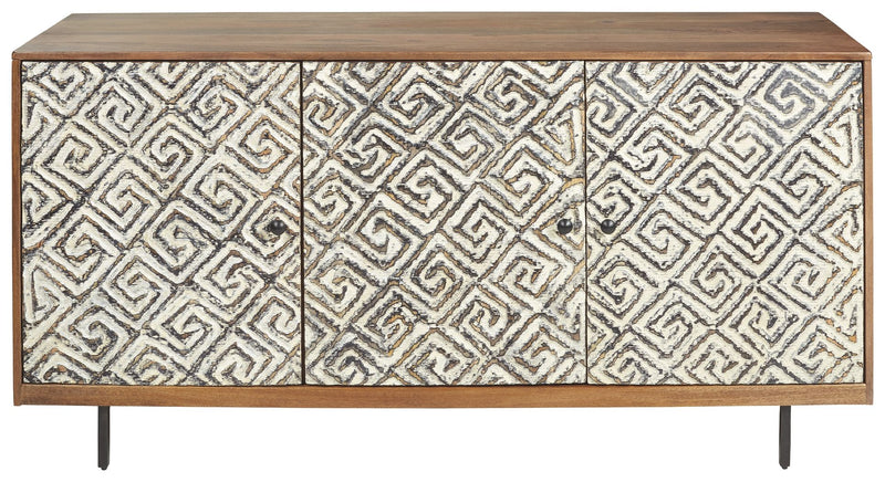 Wood accent cabinet with three patterned doors, white with black maze design, black legs.