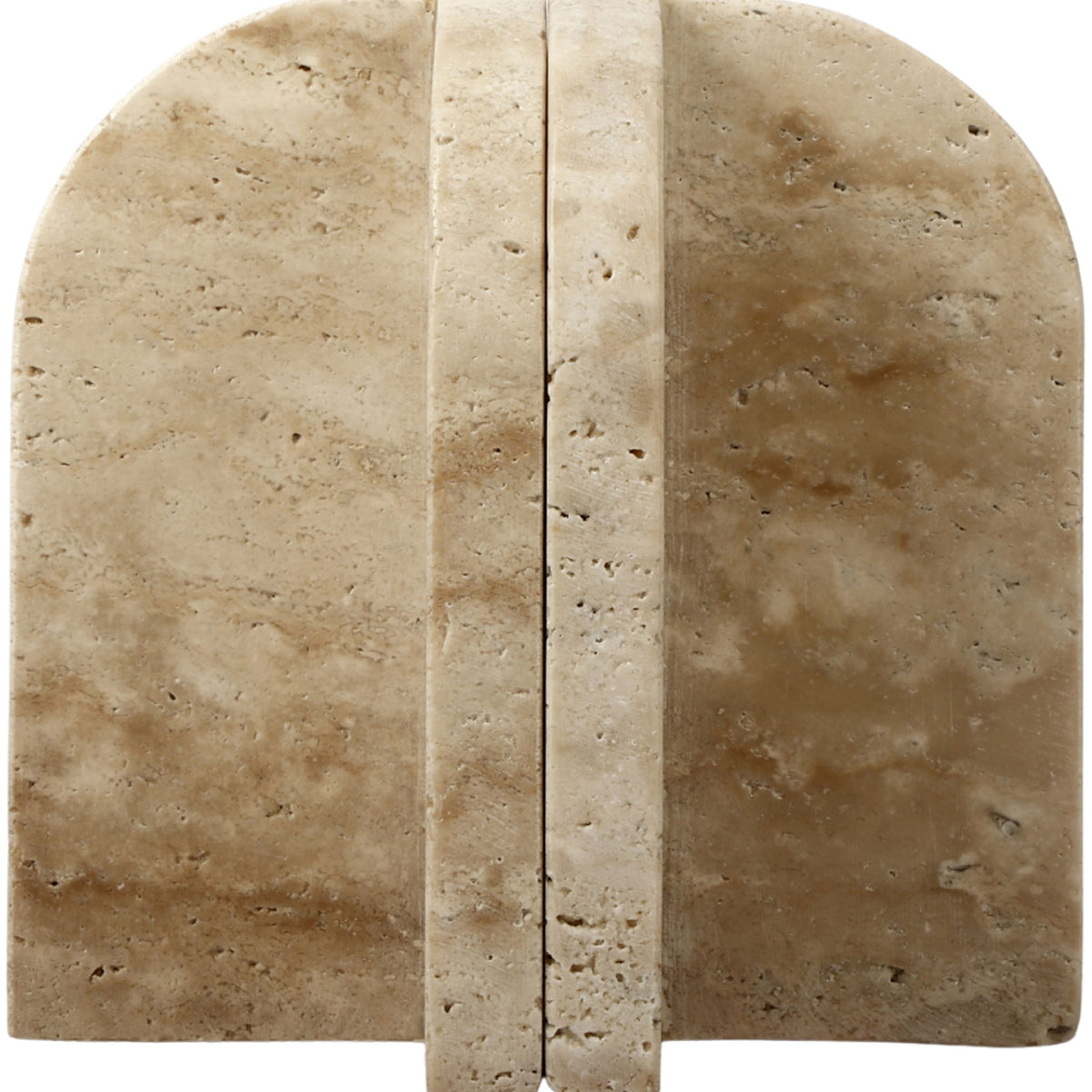 Travertine marble bookend with arched face and vertical center slot, speckled