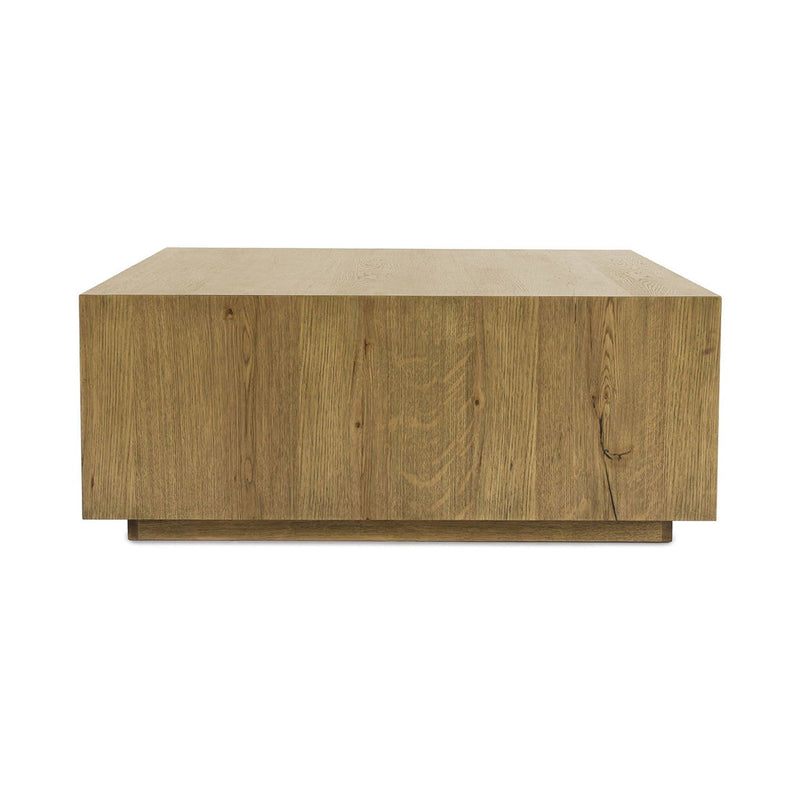 Square coffee table in light brown wood with smooth tabletop and low caster-style base