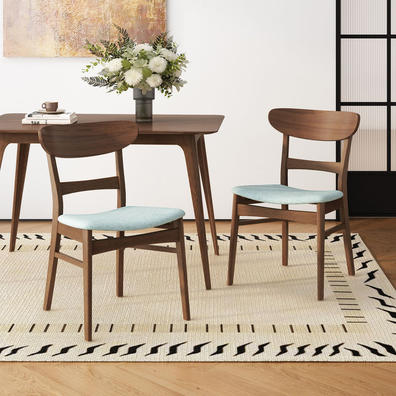 Light wood dining chair with teal cushioned seat and open back slat design