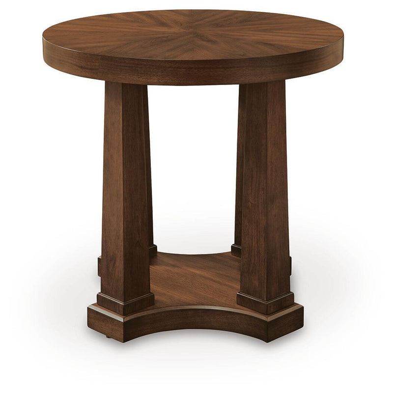 Round wooden end table with four legs and curved base