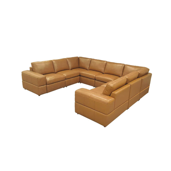 Light brown L-shaped sectional sofa with large square arms and padded cushions.