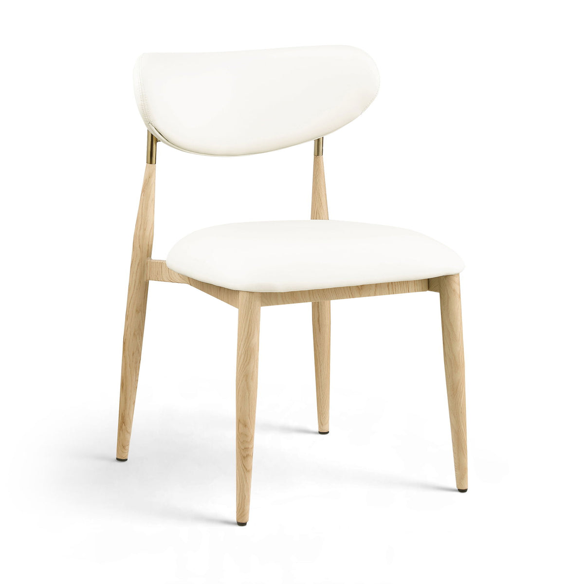 White upholstered dining side chair with light wood legs and brass accents