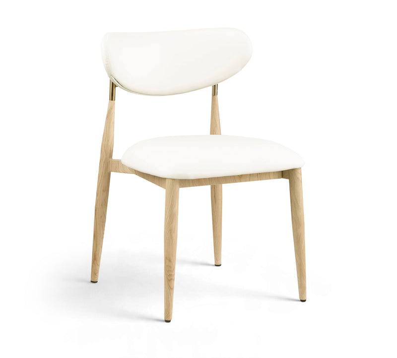 White upholstered dining side chair with light wood legs and brass accents