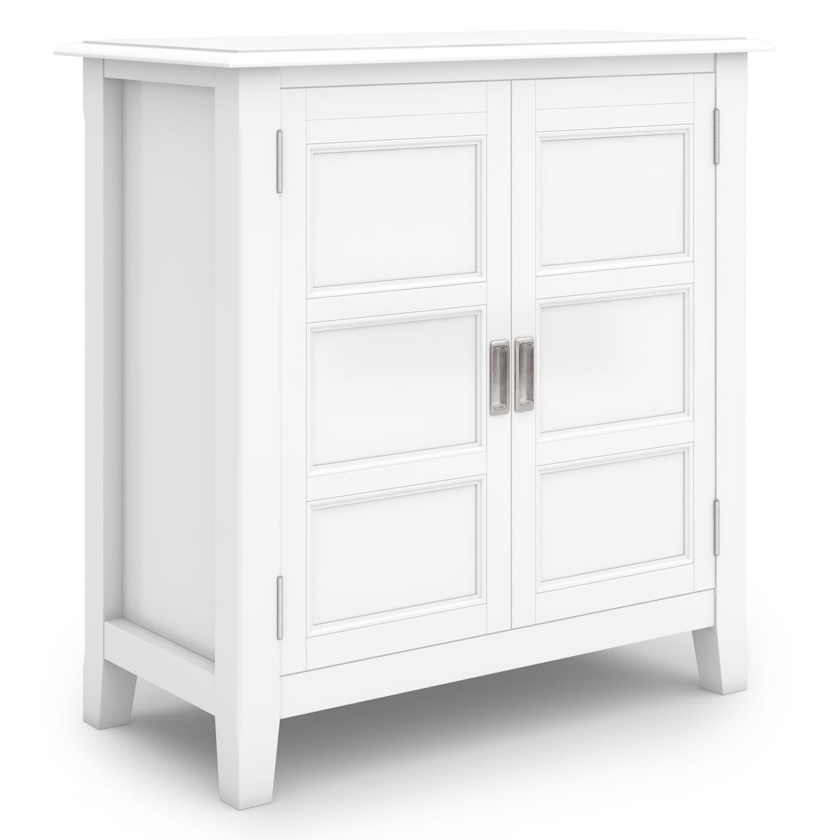 White low storage cabinet with paneled double doors and vertical metal bar handles
