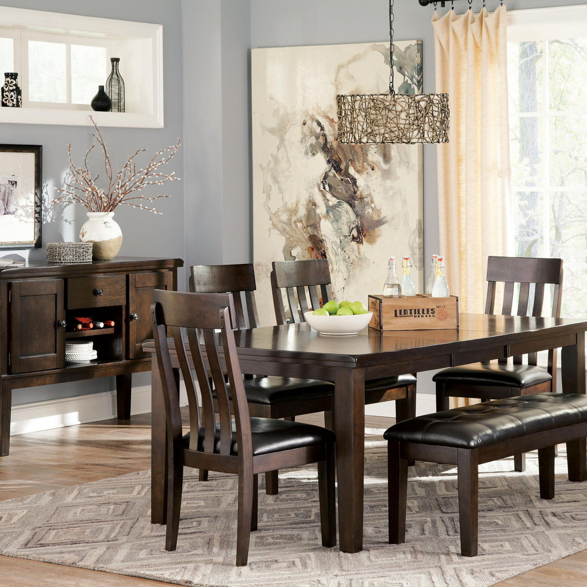 Dark brown dining side chair with vertical slat back and dark upholstered seat