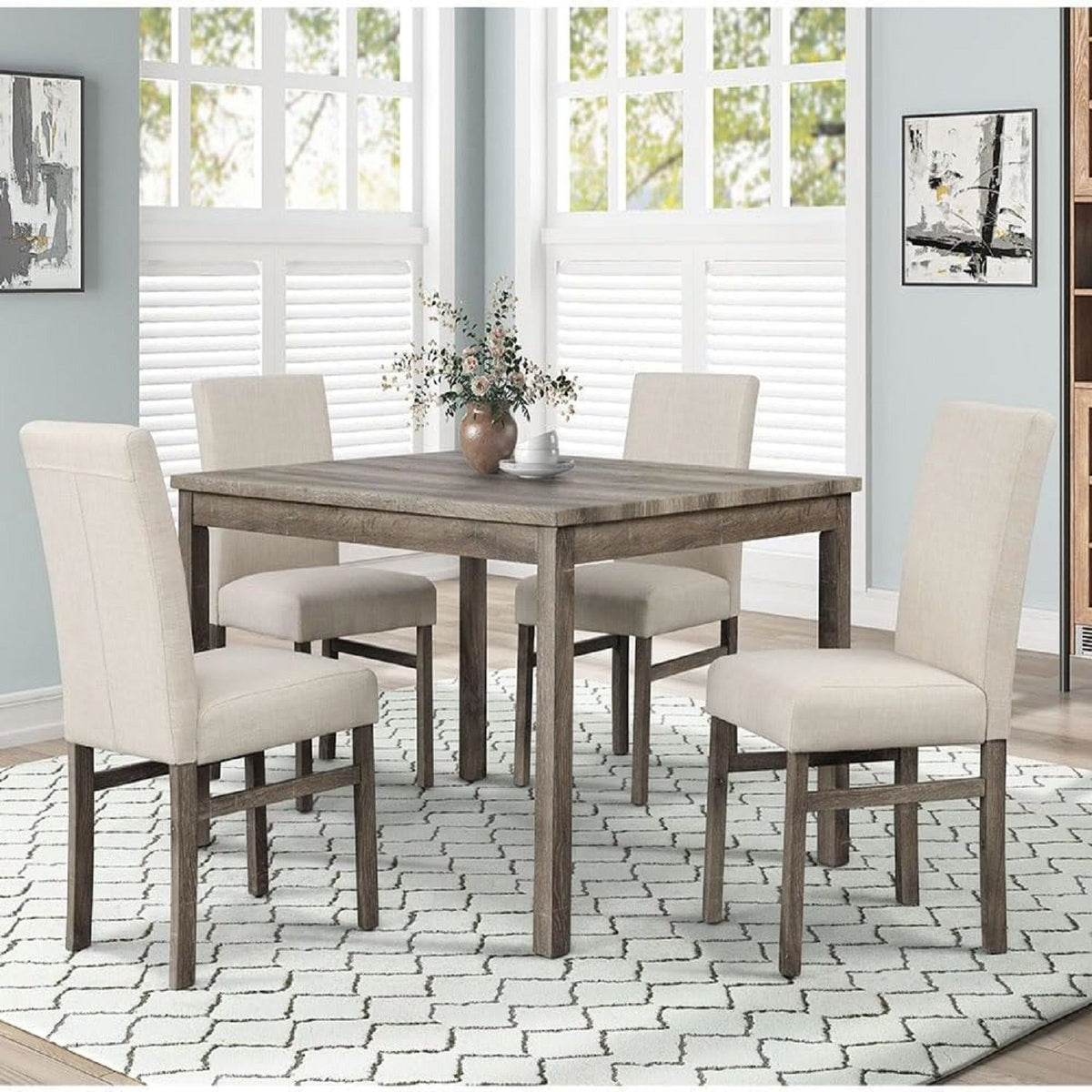 Beige upholstered dining chair pair with tall backs and padded seats around a wood table