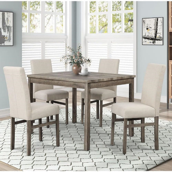Beige upholstered dining chair pair with tall backs and padded seats around a wood table