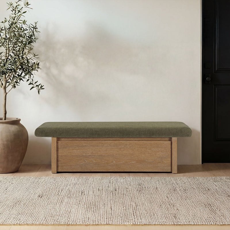 Dark green upholstered storage bench with wood sides and front drawer-style compartment.