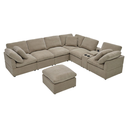 Light brown L-shaped sectional with cup holders and a matching ottoman