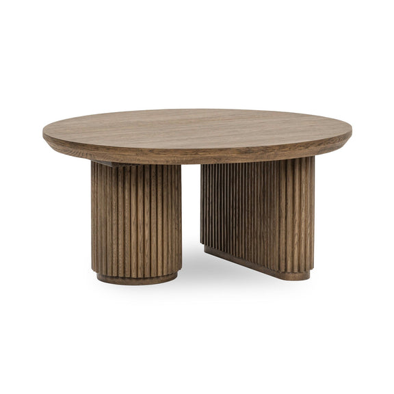 Tawny brown round solid wood coffee table with ribbed pedestal legs