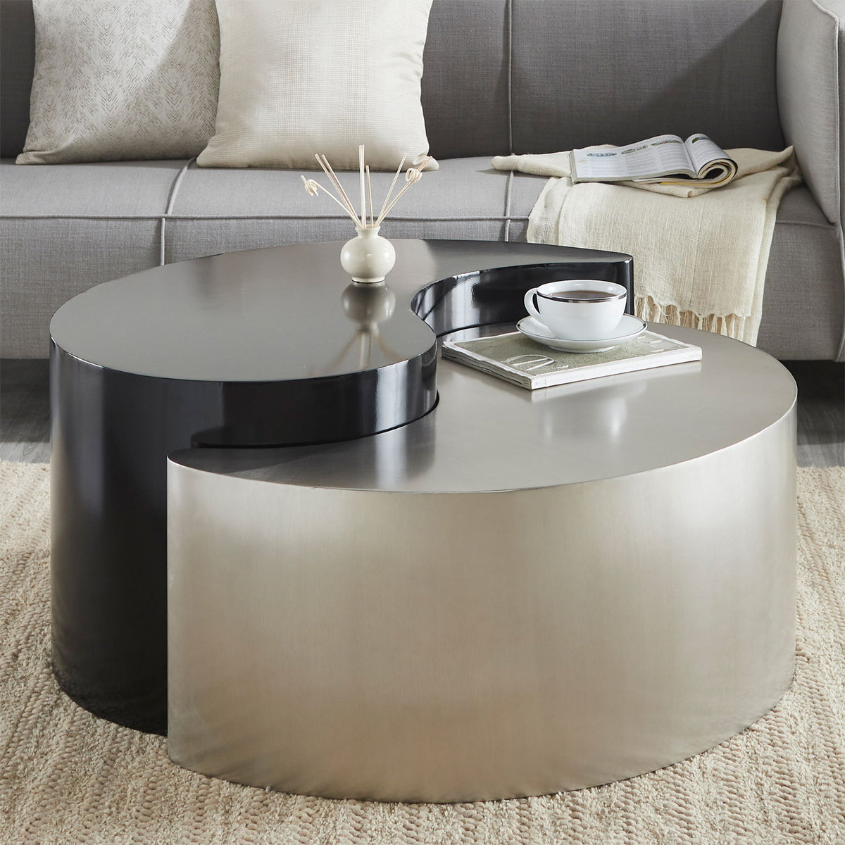 Round coffee side table with pearl silver base and black circular tabletop