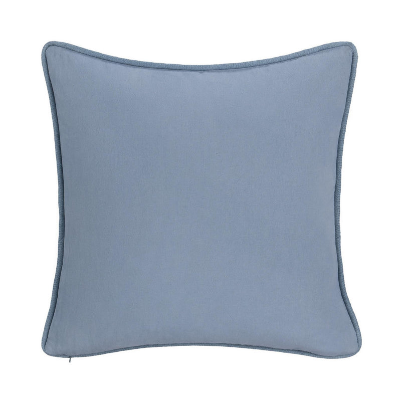 Solid blue accent pillow with contrast piping