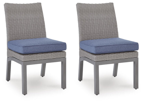 Two gray woven side chairs with blue cushions and gray legs