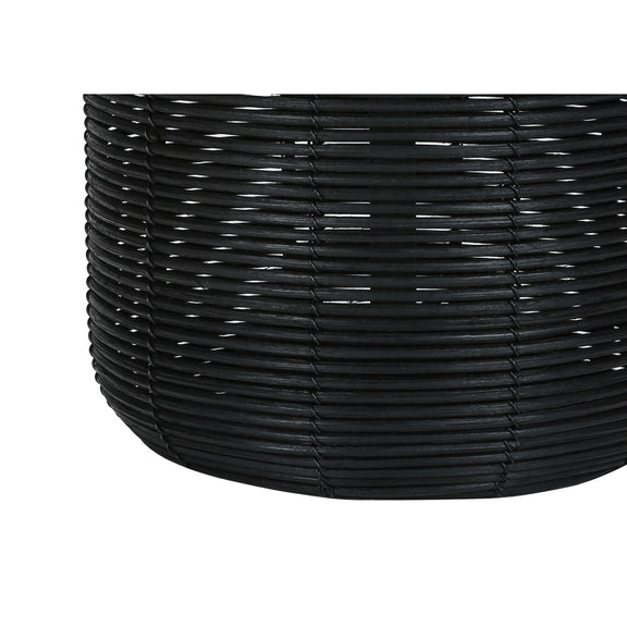 Close-up of black woven rattan base on a modern table lamp
