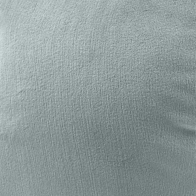 Close-up of beige textured fabric on a round Boba-style pillow