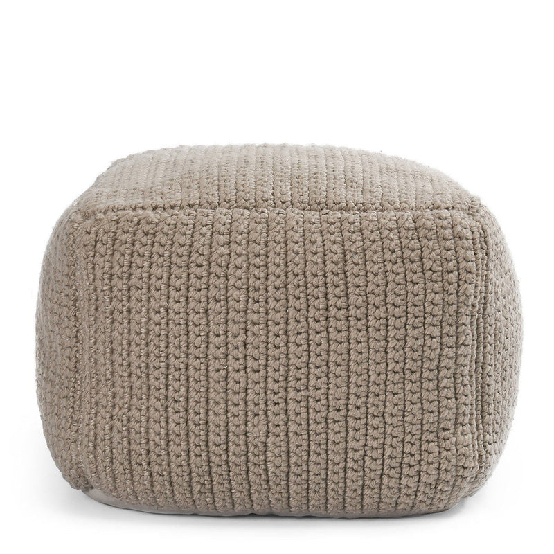 Natural beige knitted pouf with ribbed texture and rounded cylindrical shape