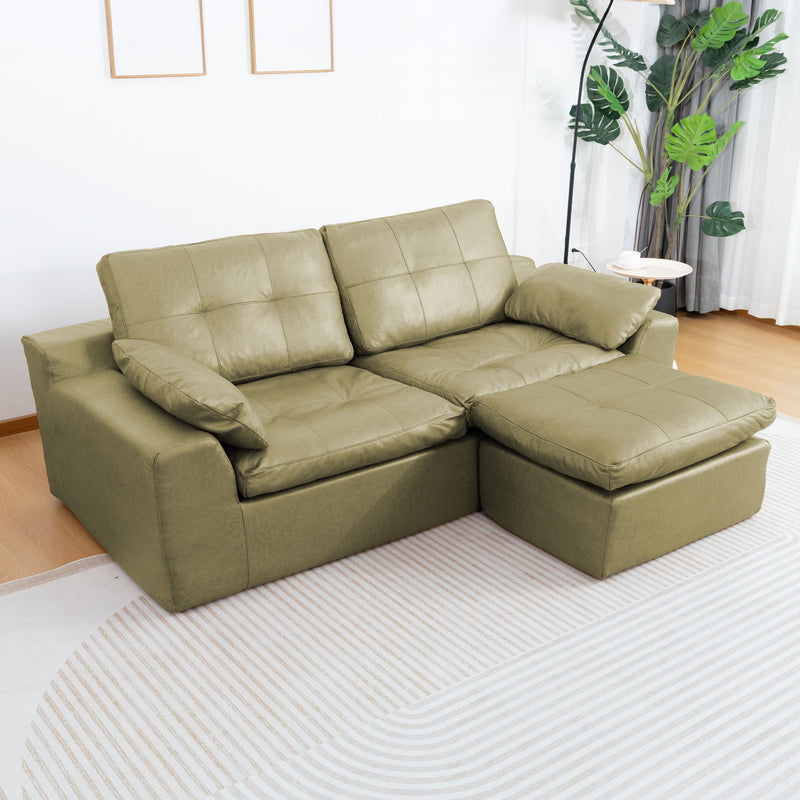L-shaped 2-seater sofa with movable ottoman, olive-green fabric cushions.