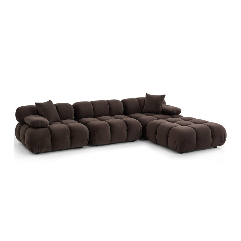 Dark brown modular sectional sofa with rounded arms, layered seat cushions, and back pillow accents