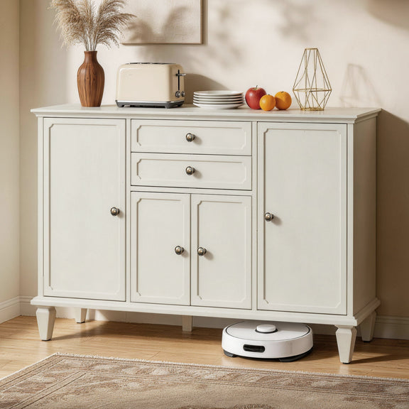 White sideboard buffet with four doors and two drawers, shown in a home setting