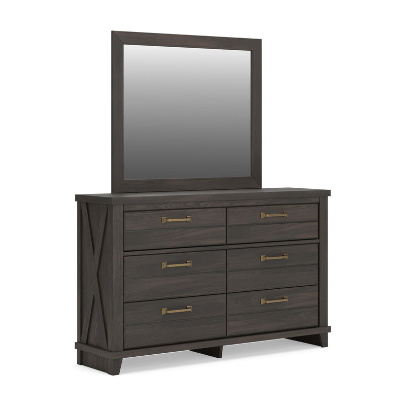 Dark brown six-drawer dresser with brass-tone pulls and matching framed mirror