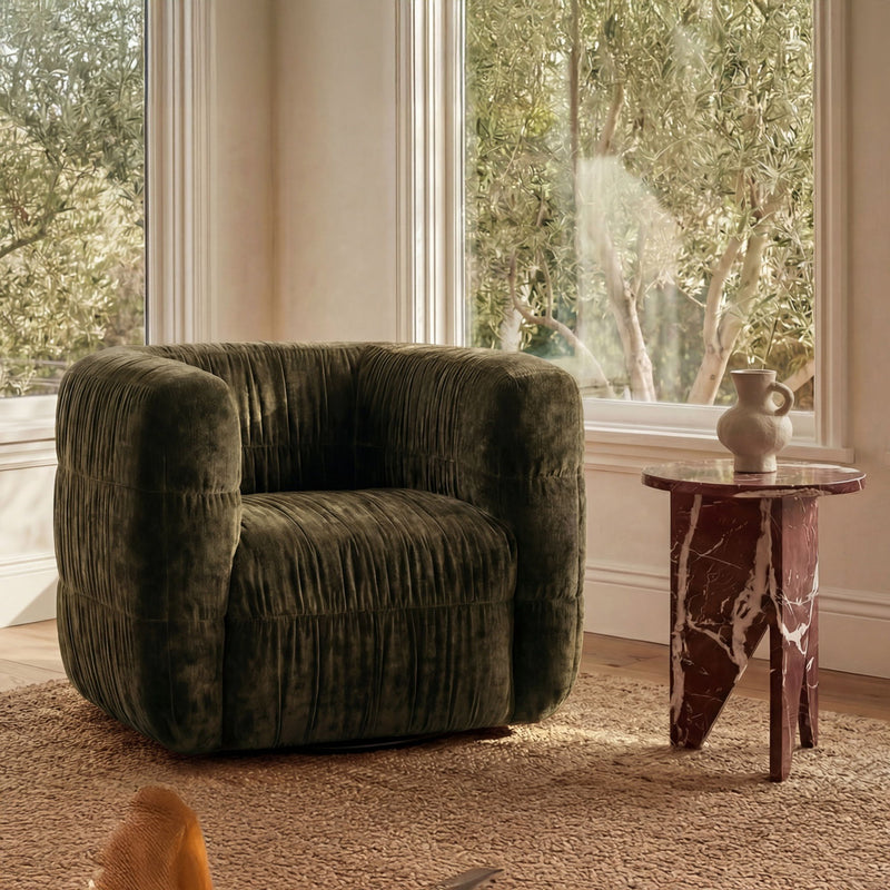 Dark green upholstered swivel chair with rounded back and armrests